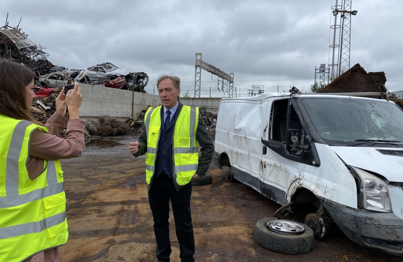 Cllr Carl Edwards being interviewed in front of the flytipper’s van